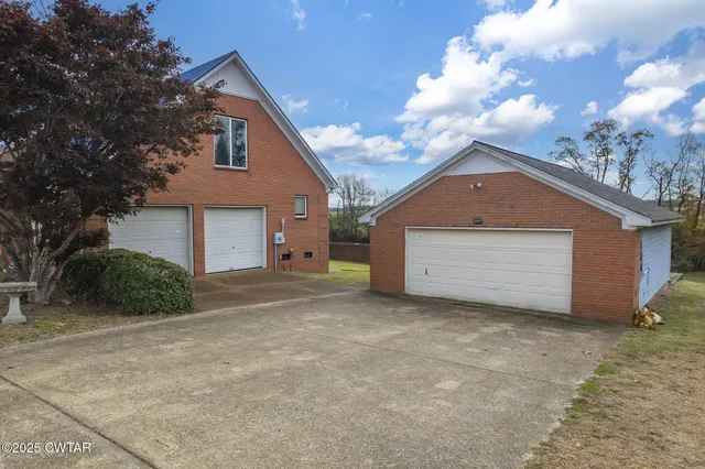 a view of a balcony with wooden floor