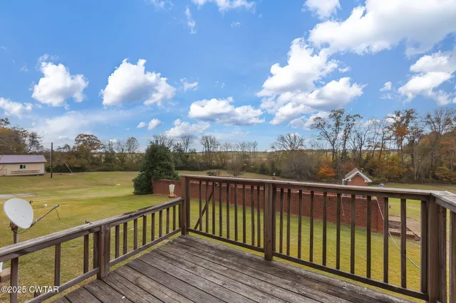 a view of a living room with furniture