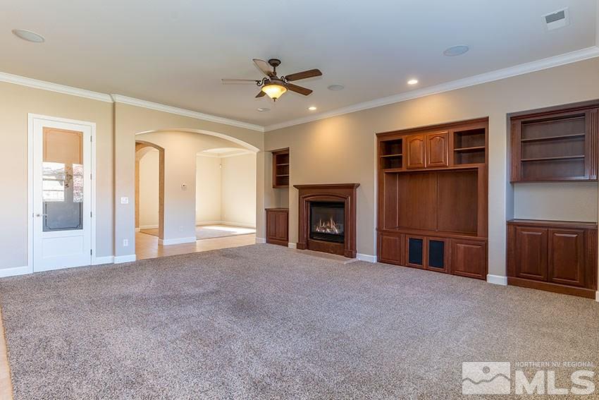 2635 Trail Rider Drive Reno, NV 89521 - Photo 11 of 25 a view of an empty room with a fireplace