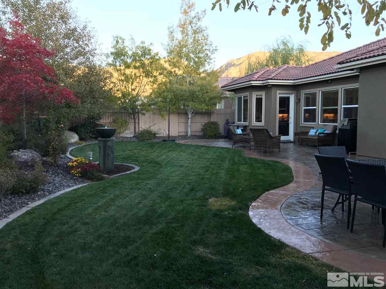 2635 Trail Rider Drive Reno, NV 89521 - Photo 23 of 25 a view of a house with a backyard