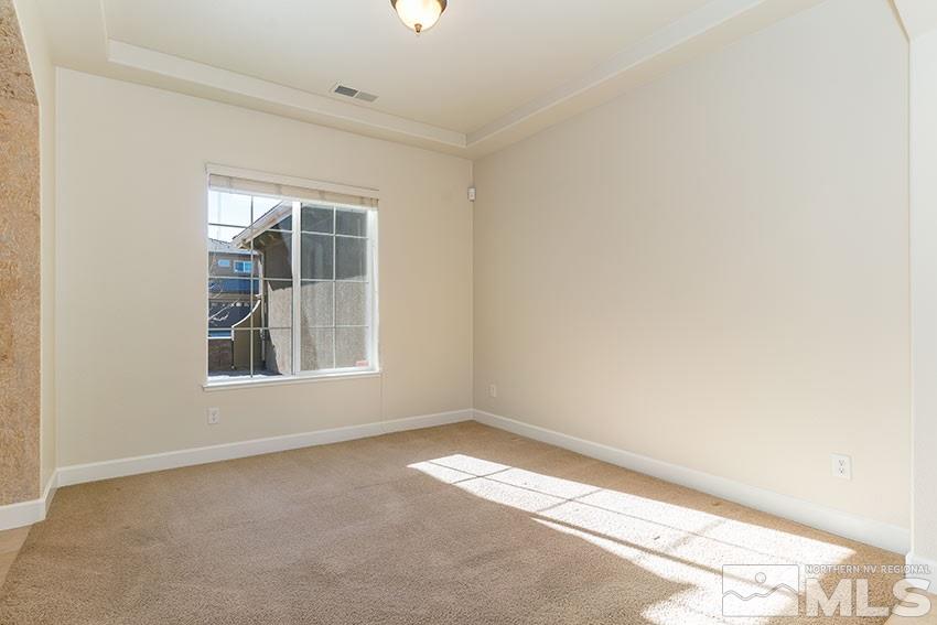 2635 Trail Rider Drive Reno, NV 89521 - Photo 4 of 25 an empty room with a window