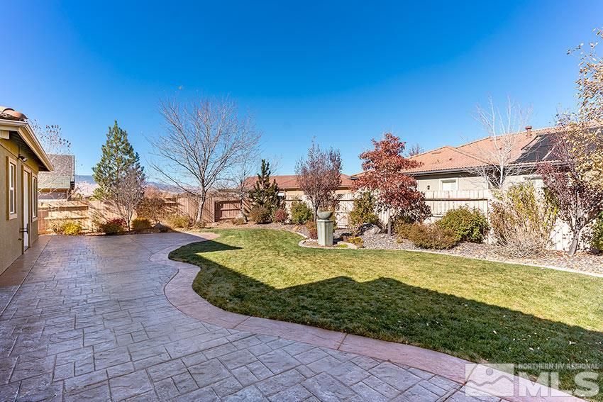 2635 Trail Rider Drive Reno, NV 89521 - Photo 8 of 25 a view of a yard with yellow house