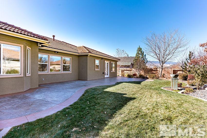 2635 Trail Rider Drive Reno, NV 89521 - Photo 9 of 25 a view of a house with a yard