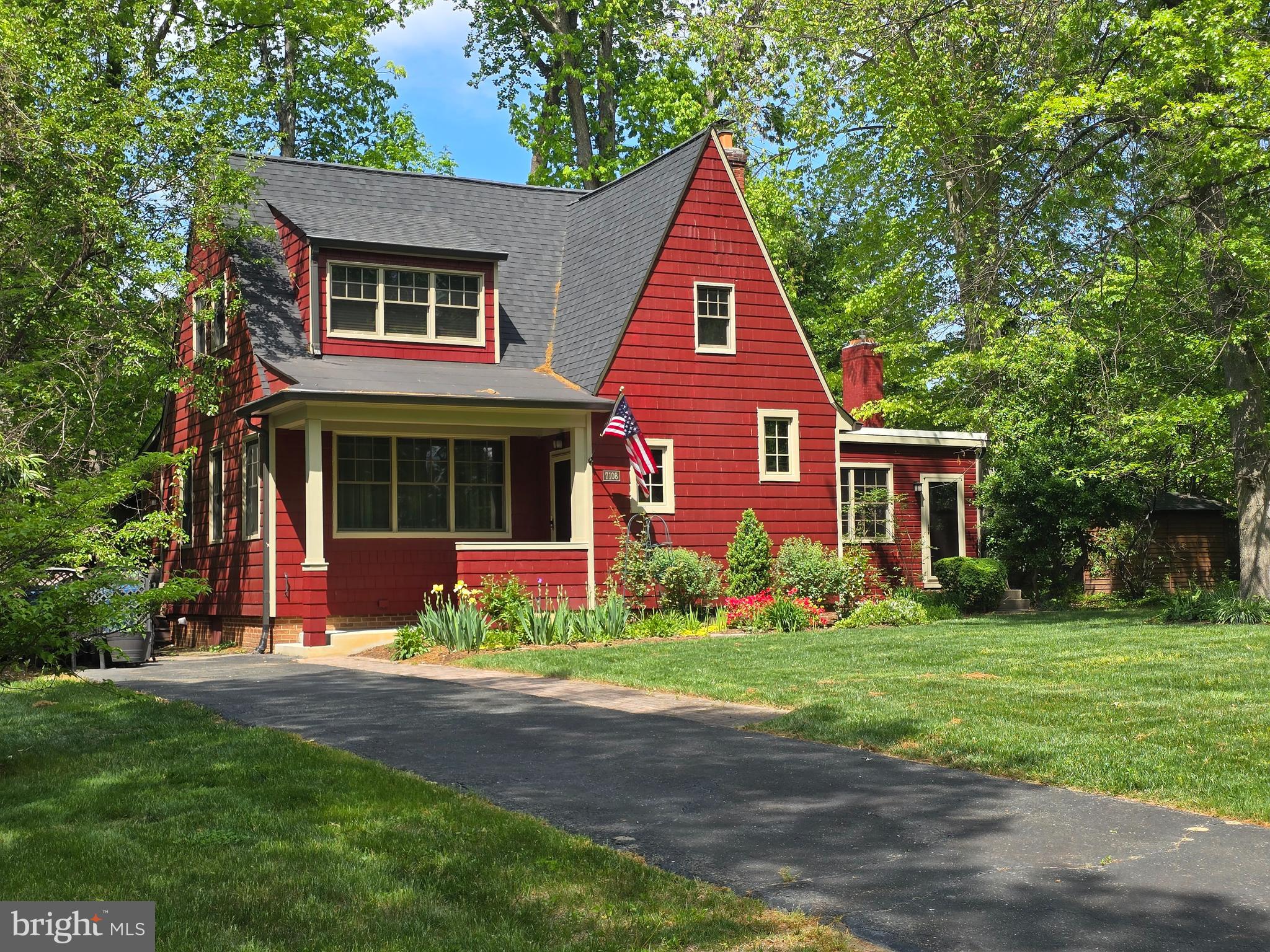 7108 Larrlyn Drive Springfield, VA 22151 - Photo 3 of 50 a front view of a house with a yard