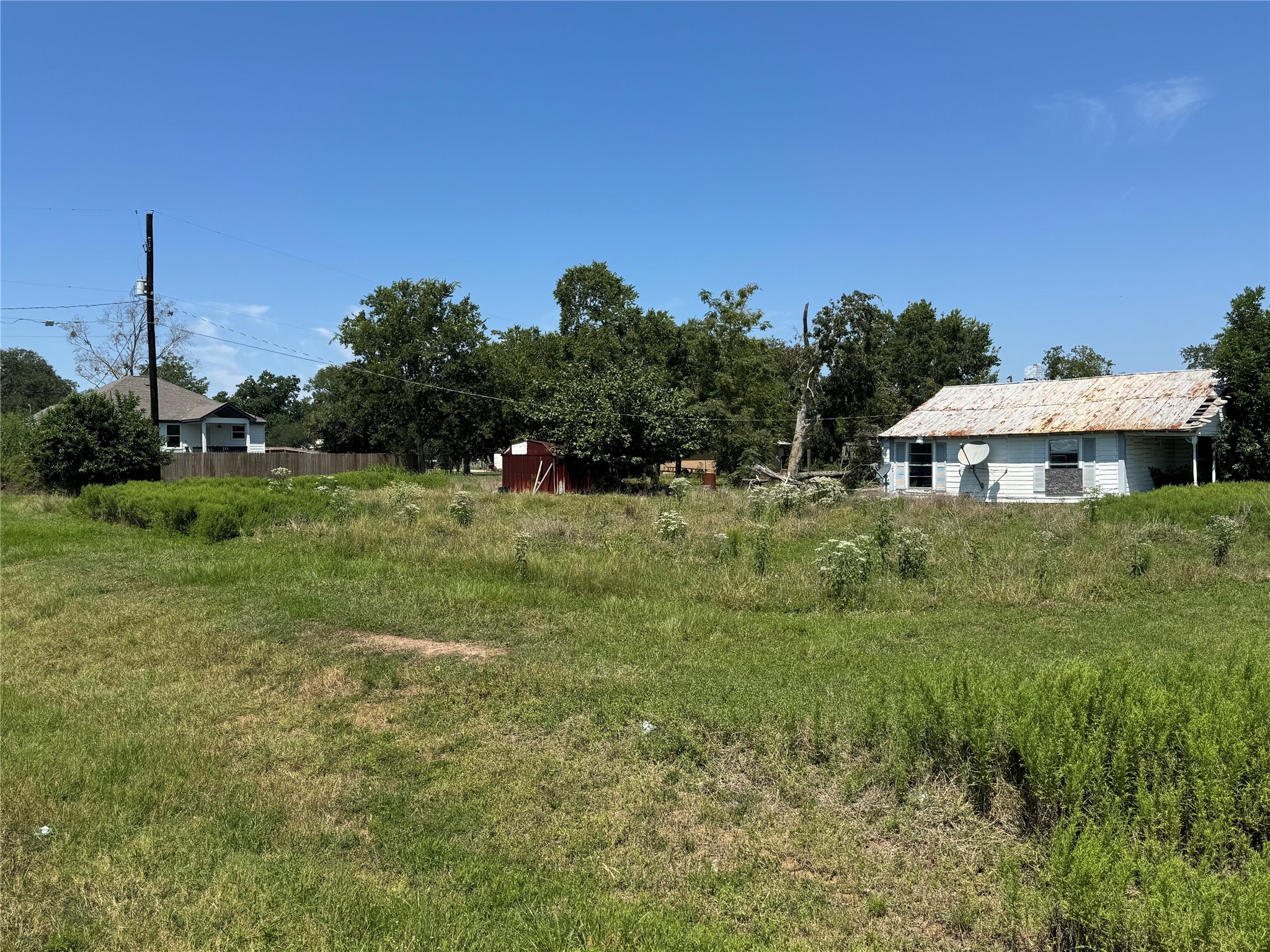 1035 21st Street Hempstead, TX 77445 - Photo 3 of 4 a view of a house with a big yard