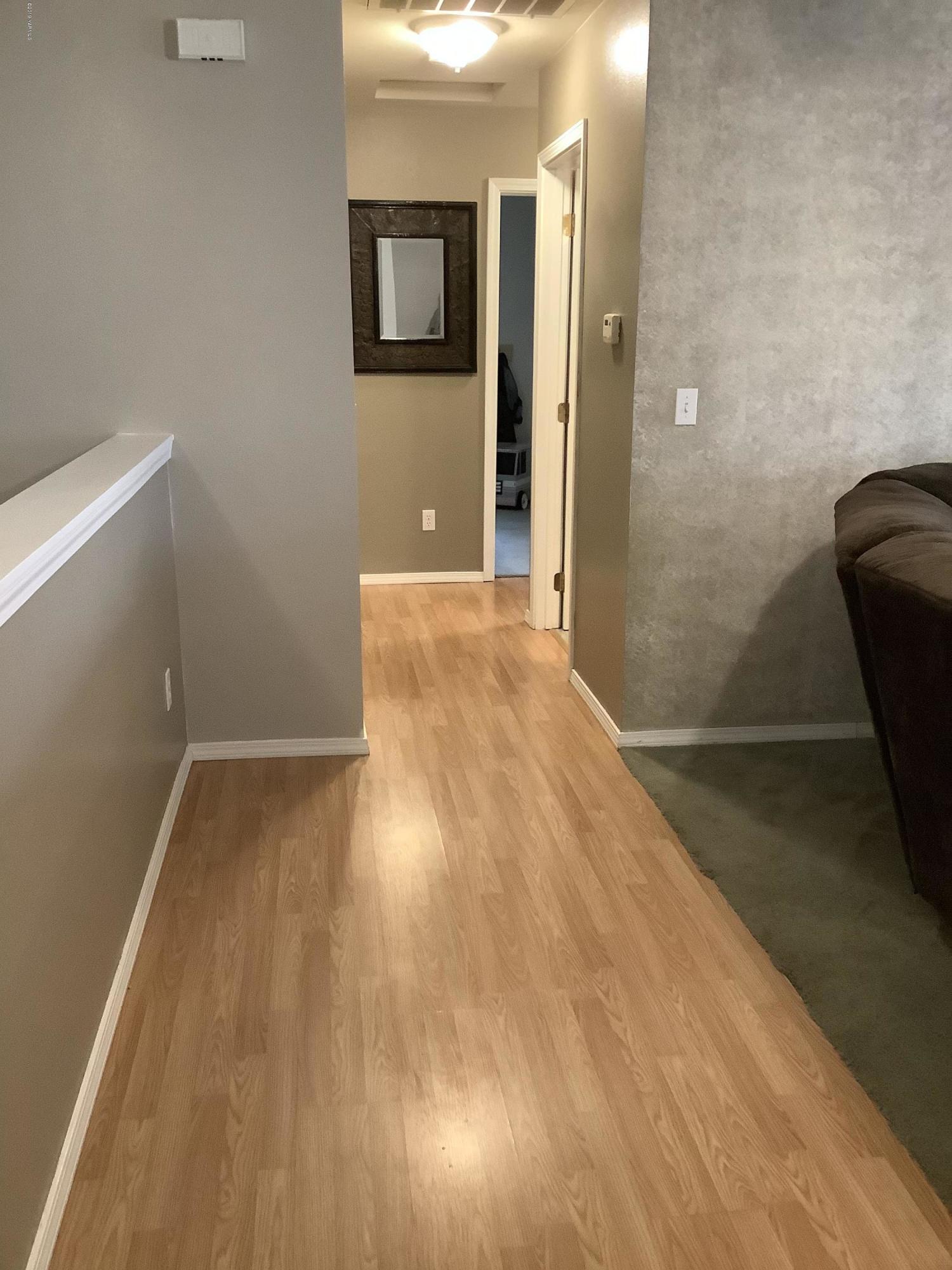 15021 Douglas Road Yakima, WA 98908 - Photo 12 of 35 a view of a room with wooden floor and bathroom