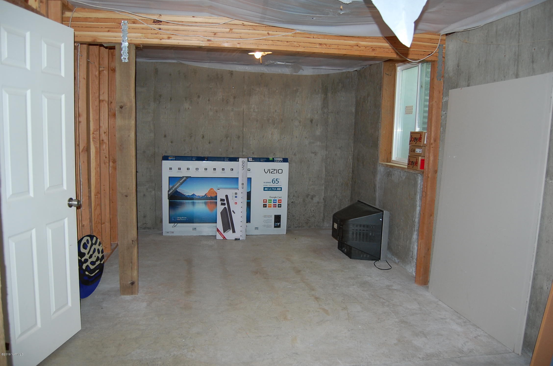 15021 Douglas Road Yakima, WA 98908 - Photo 26 of 35 a living room with furniture and a fireplace