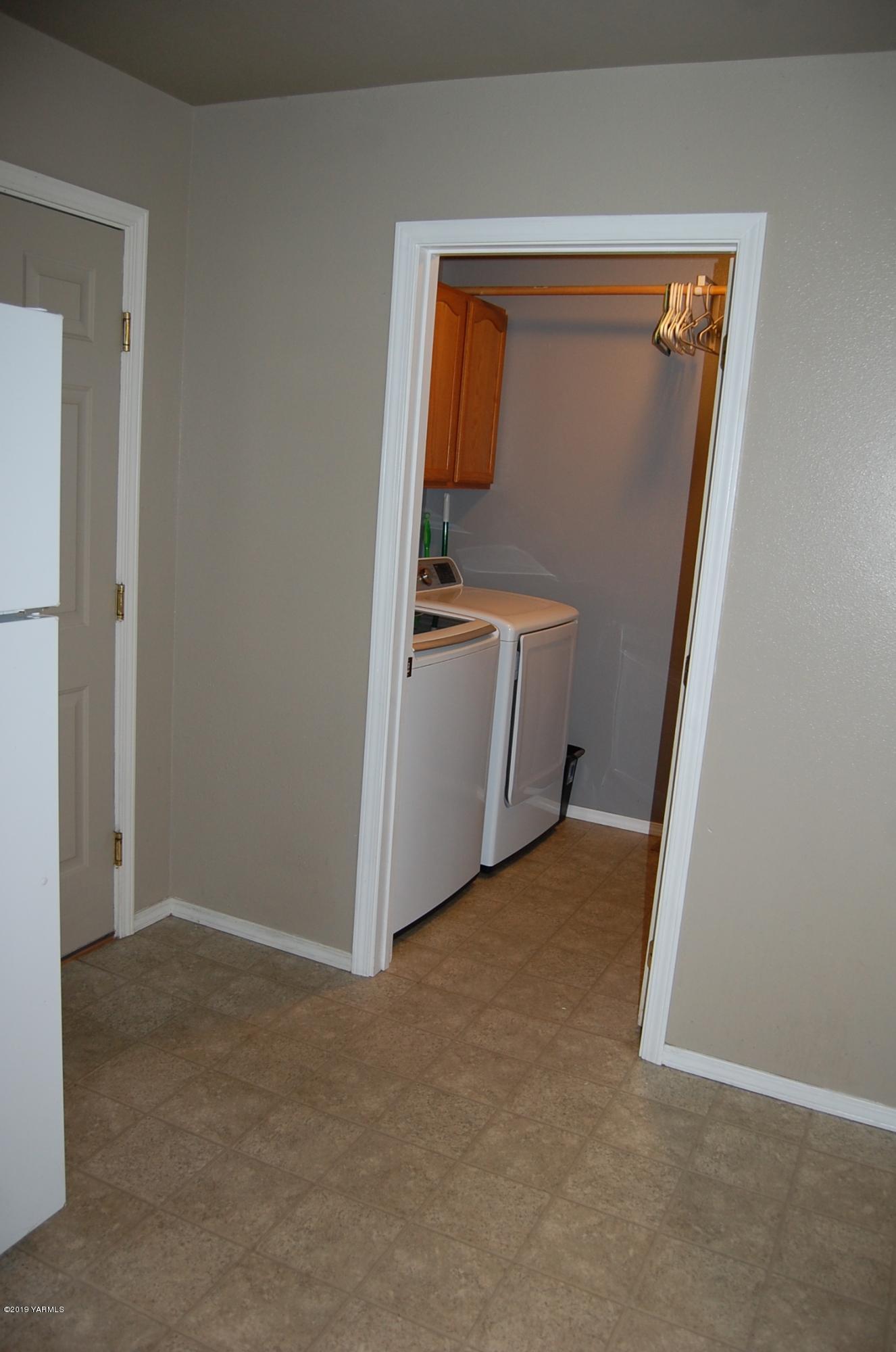 15021 Douglas Road Yakima, WA 98908 - Photo 10 of 35 a view of a storage & utility room with a sink