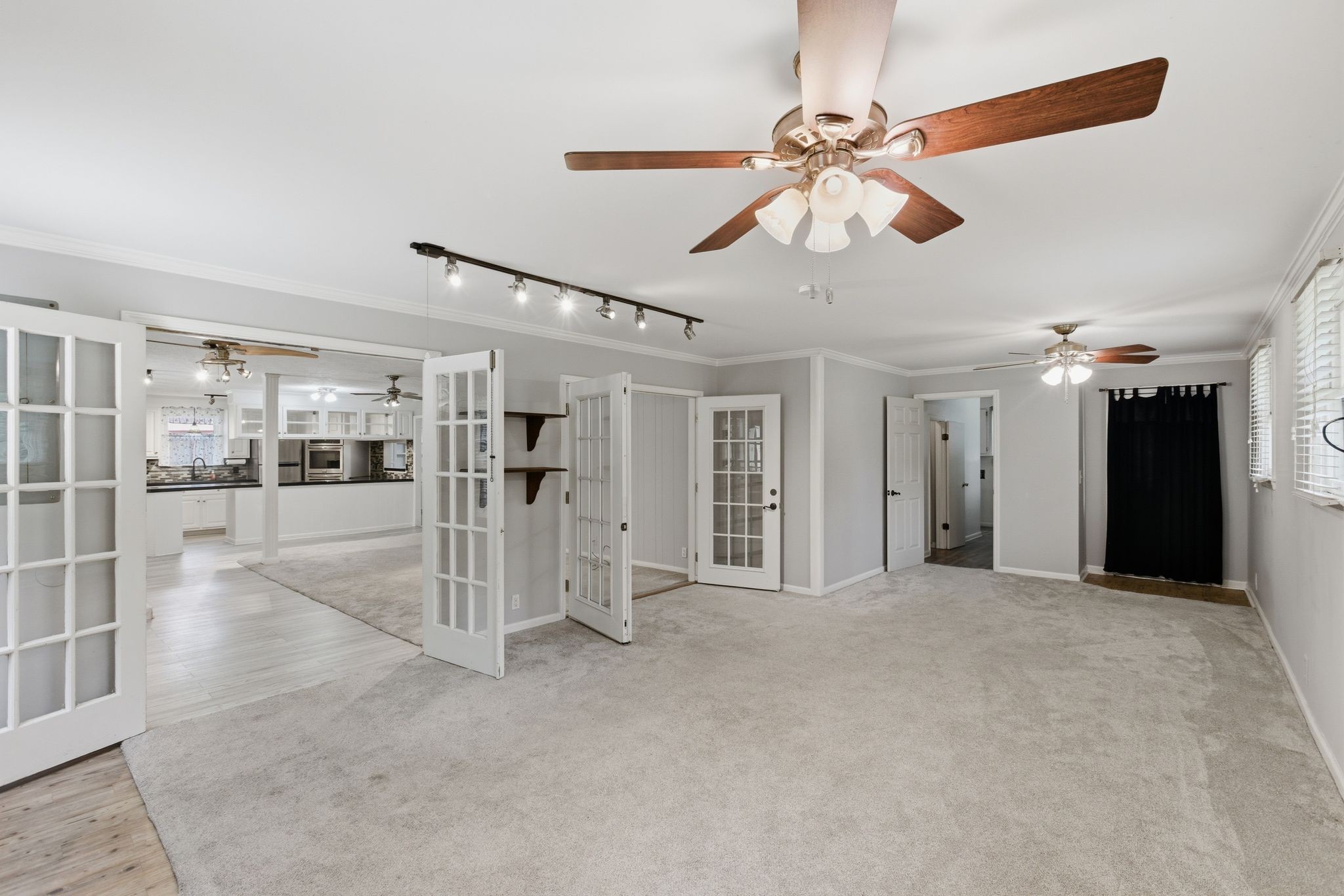 580 Defeated Creek Road Centerville, TN 37033 - Photo 24 of 71 a view of empty room with wooden floor and fan