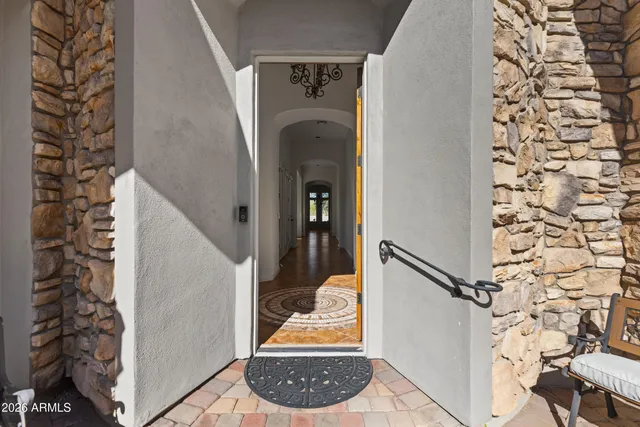 a view of a hallway with windows