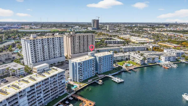an aerial view of city and lake view