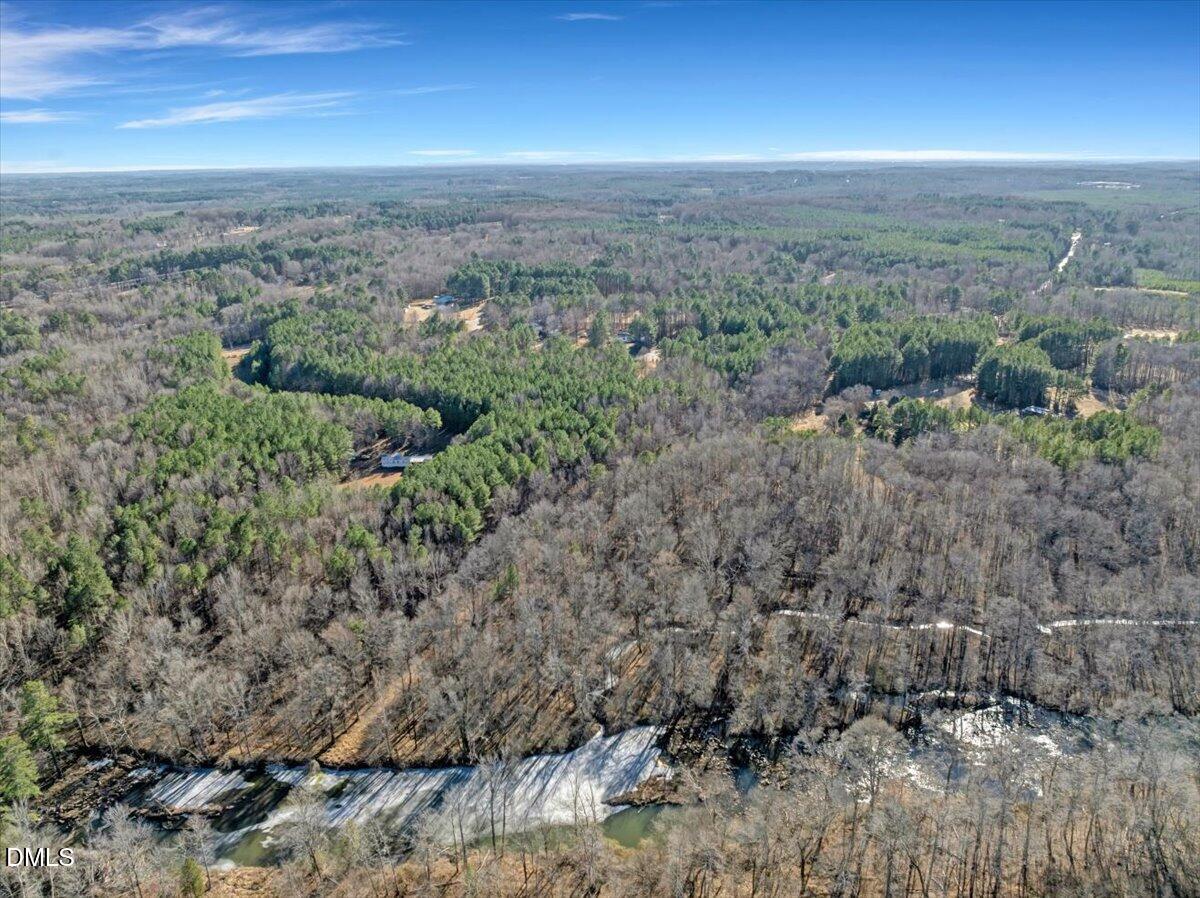 11.22 Belltown Road Oxford, NC 27565 - Photo 6 of 23 a view of a forest with a mountain view