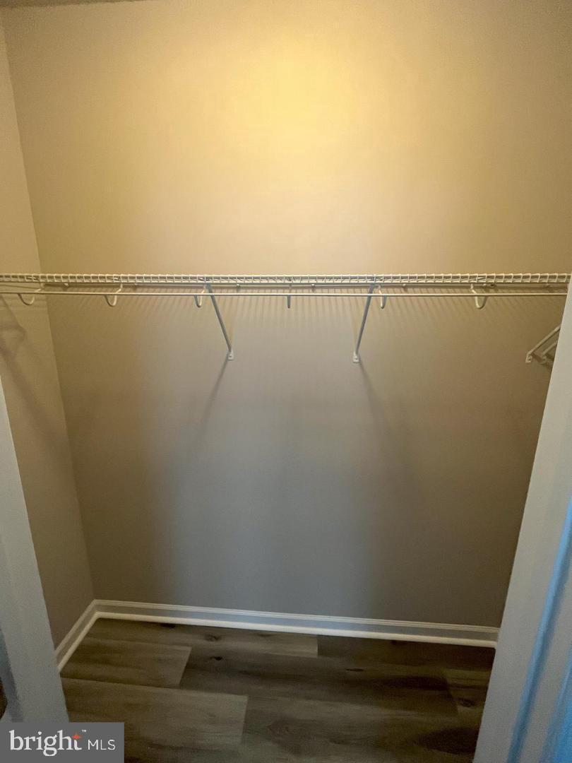 1321 Karen Boulevard, Unit 302 Capitol Heights, MD 20743 - Photo 10 of 14 a view of a room with racks on the wall