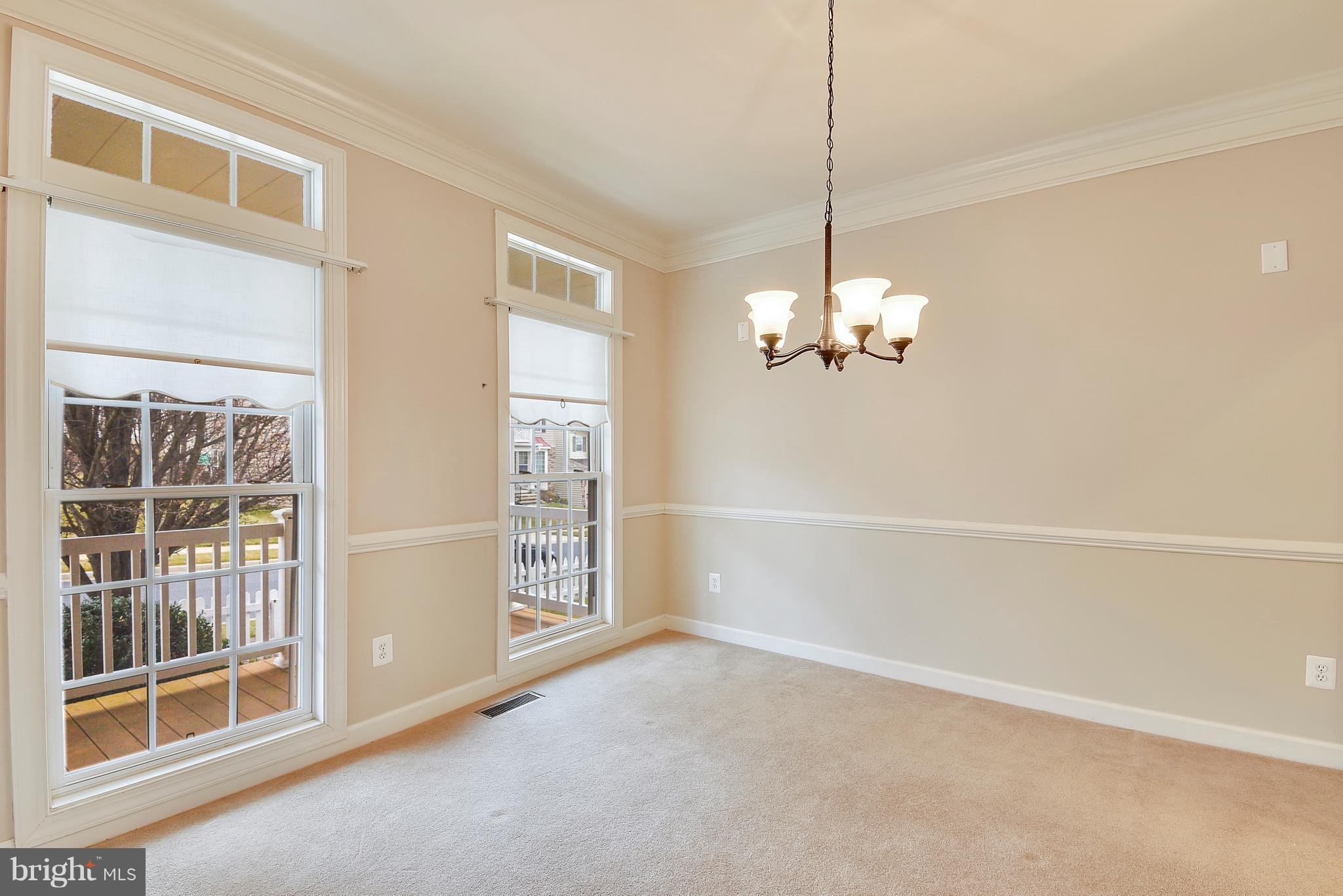 12318 Cypress Spring Road Clarksburg, MD 20871 - Photo 7 of 30 FORMAL DINING ROM W/NEW WROUGHT IRON CHANDELIER