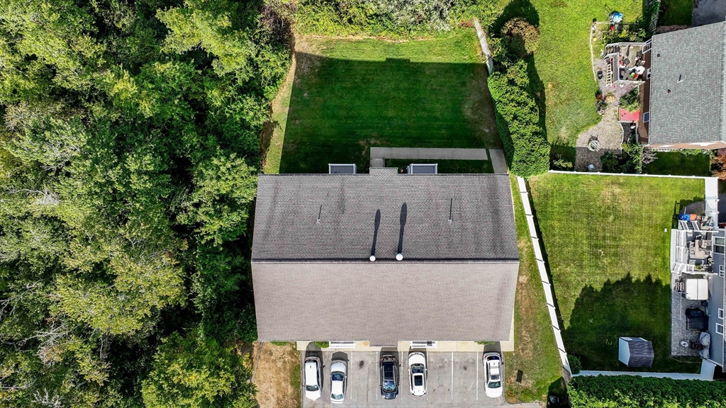 1475 Braley Road, Unit 22 New Bedford, MA 02745 - Photo 19 of 19 an aerial view of a house with a yard
