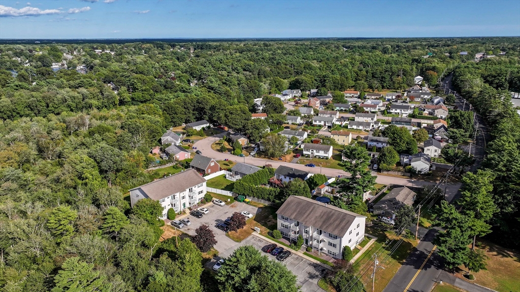 1475 Braley Road, Unit 22 New Bedford, MA 02745 - Photo 4 of 19 an aerial view of a house with a yard