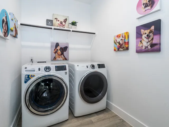 a white bath tub sitting next to a shower