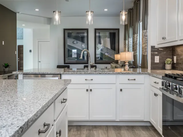 a view of a dining room with furniture and window