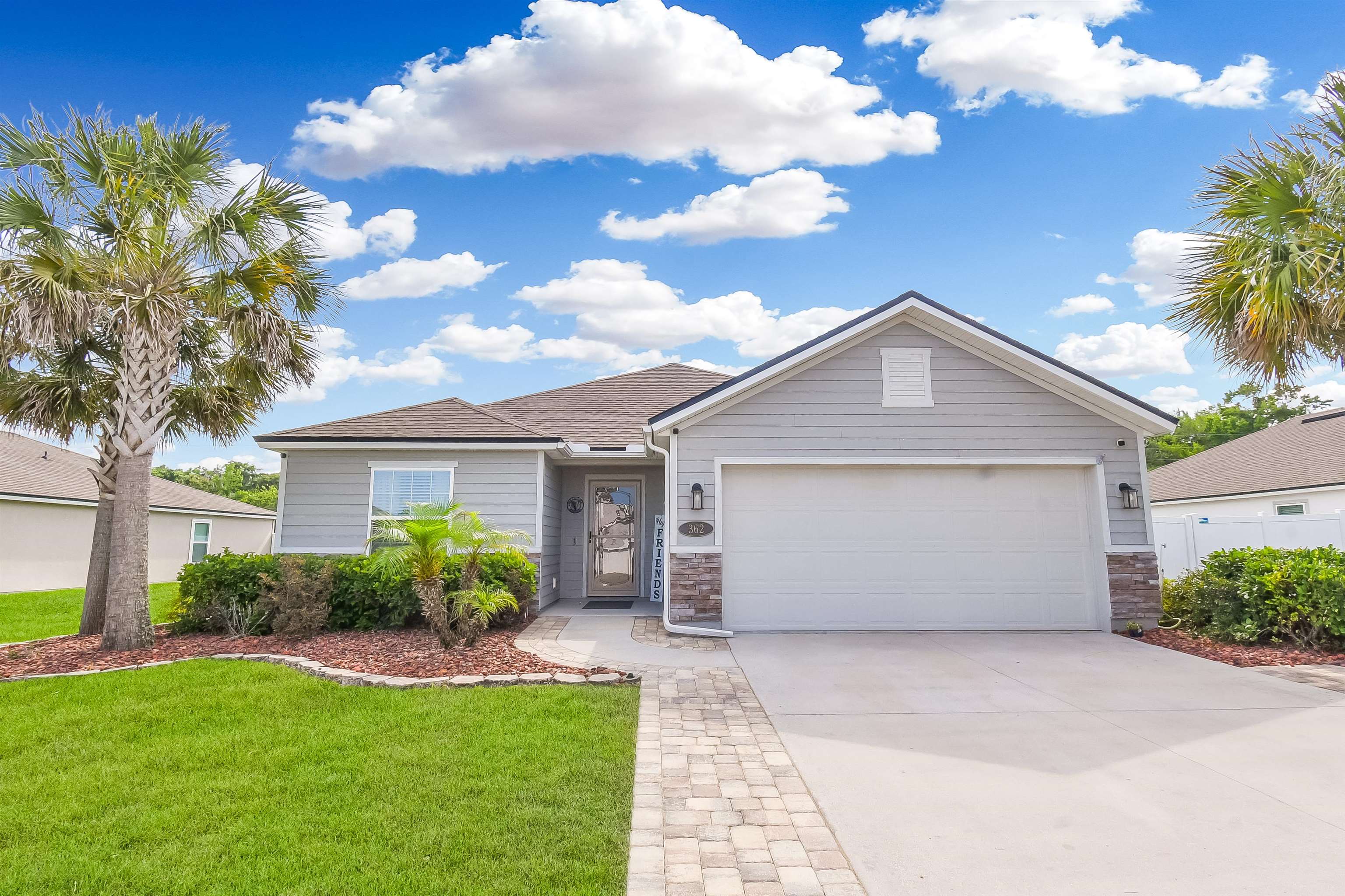 362 South Hamilton Springs Road St. Augustine, FL 32084 - Photo 1 of 37 a view of a house with a yard and plants
