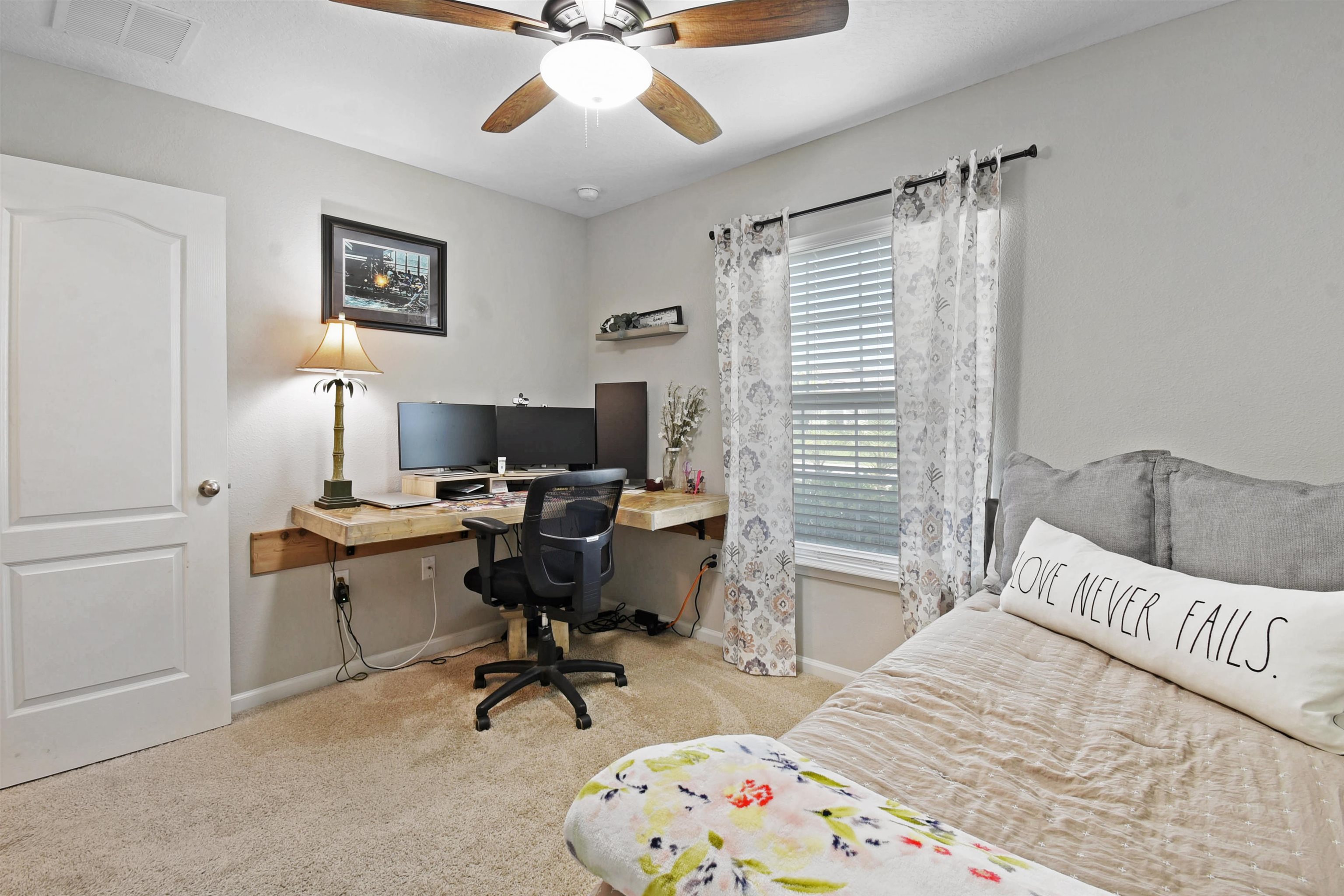 362 South Hamilton Springs Road St. Augustine, FL 32084 - Photo 21 of 37 a bedroom with a bed and a desk