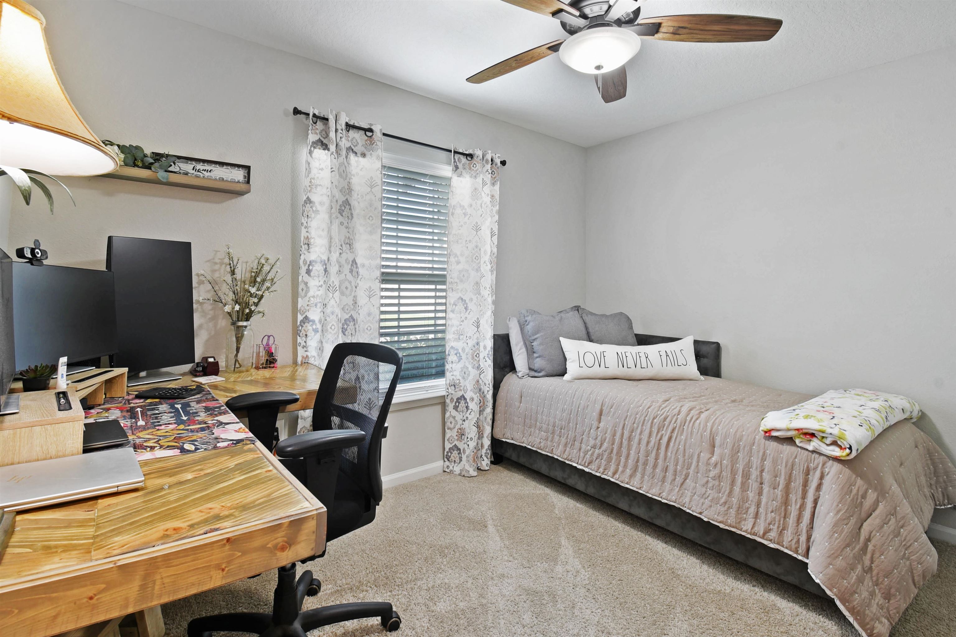 362 South Hamilton Springs Road St. Augustine, FL 32084 - Photo 22 of 37 a bedroom with a bed and a flat screen tv