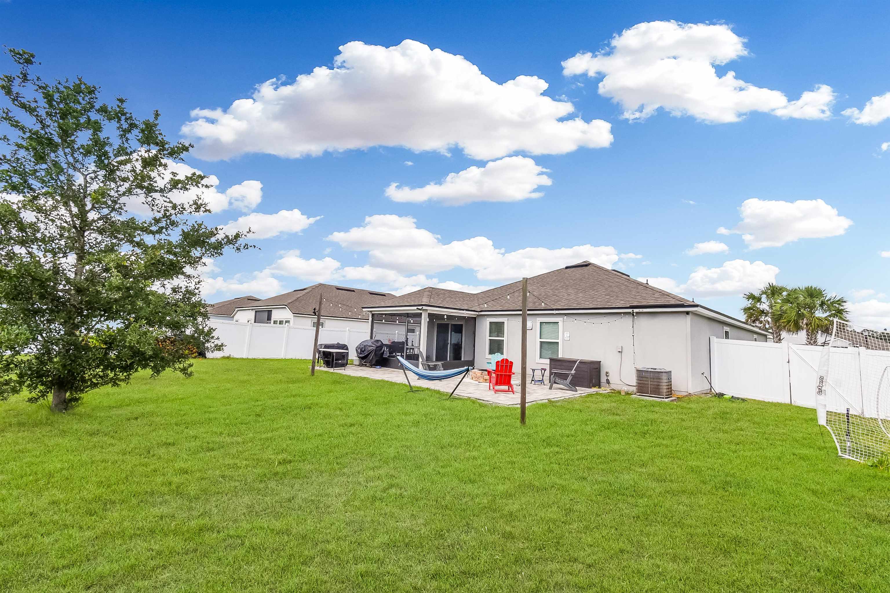 362 South Hamilton Springs Road St. Augustine, FL 32084 - Photo 30 of 37 a view of a house with a yard