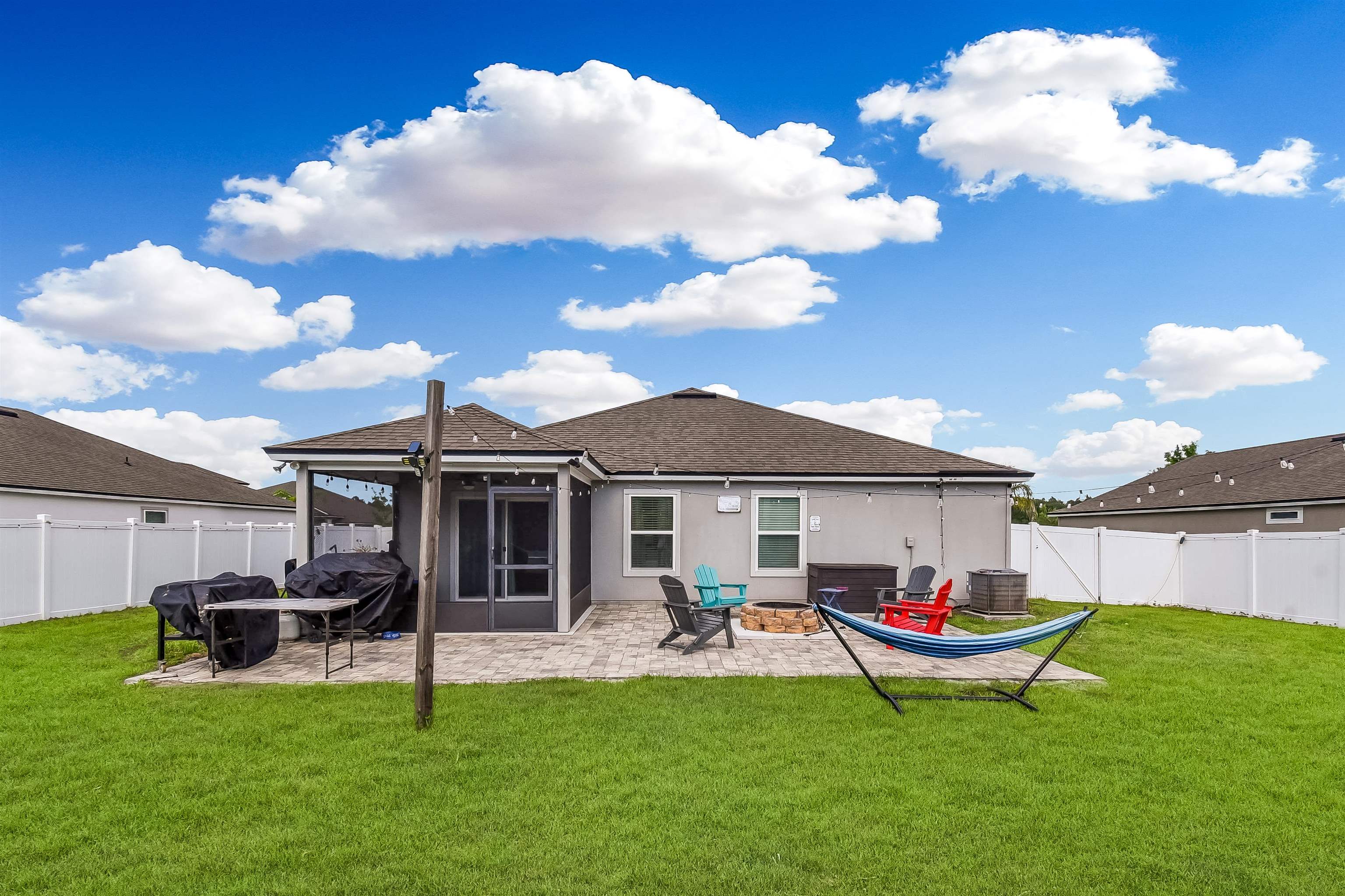 362 South Hamilton Springs Road St. Augustine, FL 32084 - Photo 31 of 37 a front view of a house with a garden and plants