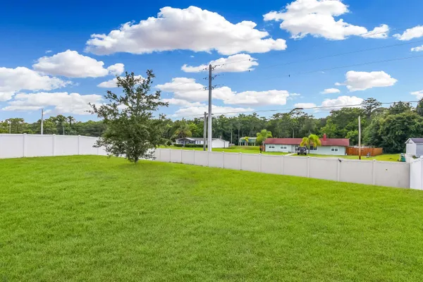 a view of park with swings and slides
