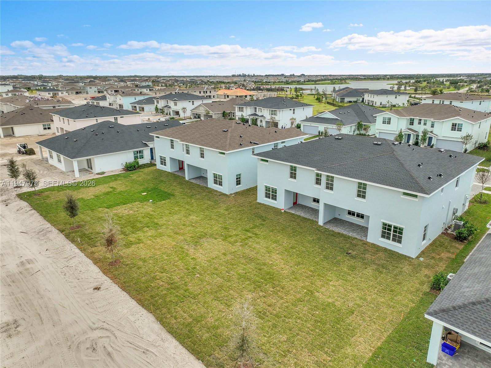 19560 Whispering Creek Road, Unit 19560 Loxahatchee, FL 33470 - Photo 18 of 19 a view of a city with an ocean view