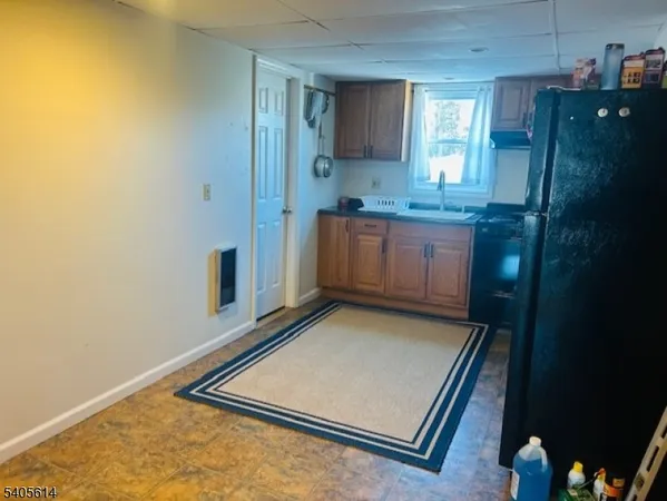 a view of a kitchen with a sink
