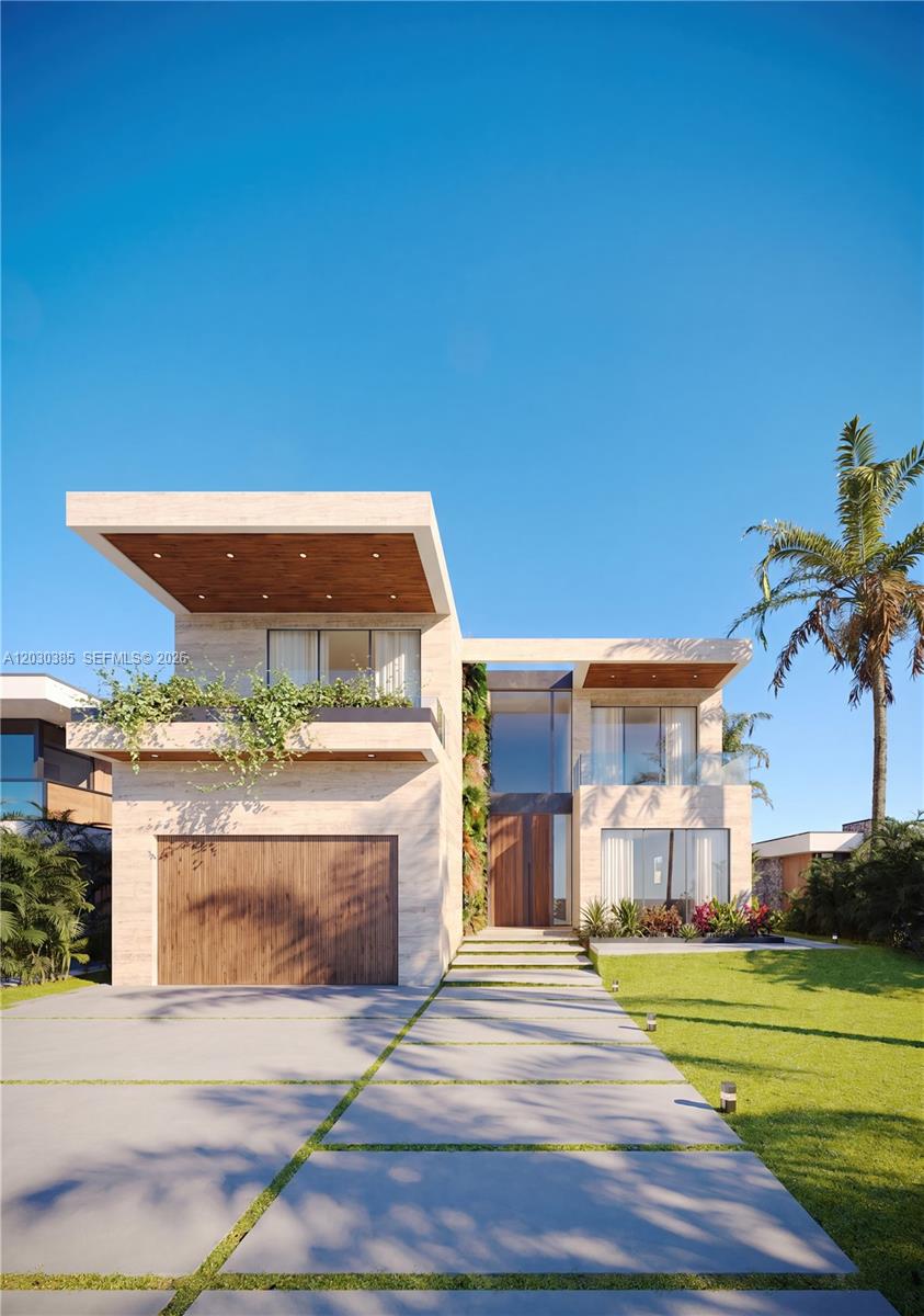 18800 North Bay Road Sunny Isles Beach, FL 33160 - Photo 5 of 17 a view of a building with a yard
