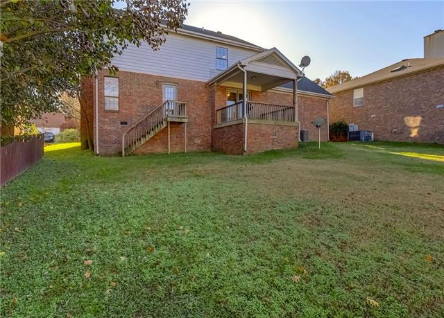 119 La View Road Hendersonville, TN 37075 - Photo 2 of 20 View of back of house from backyard. Notice the house is mostly brick.