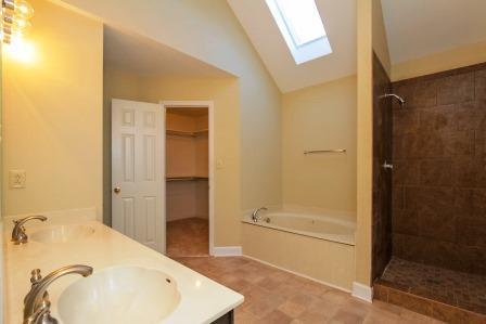 119 La View Road Hendersonville, TN 37075 - Photo 12 of 20 Huge master bathroom with separate shower and tub and huge walk-in closet. The tile in the shower is brand new and there will be a glass door installed.