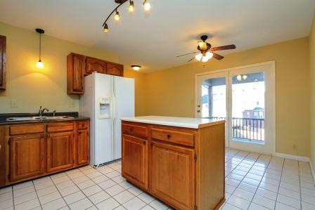 119 La View Road Hendersonville, TN 37075 - Photo 6 of 20 Another view of kitchen looking back towards breakfast nook and out towards the patio.