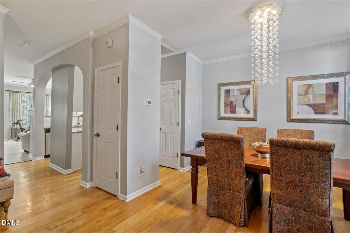 5710 Corbon Crest Lane Raleigh, NC 27612 - Photo 5 of 25 a workspace with furniture and window