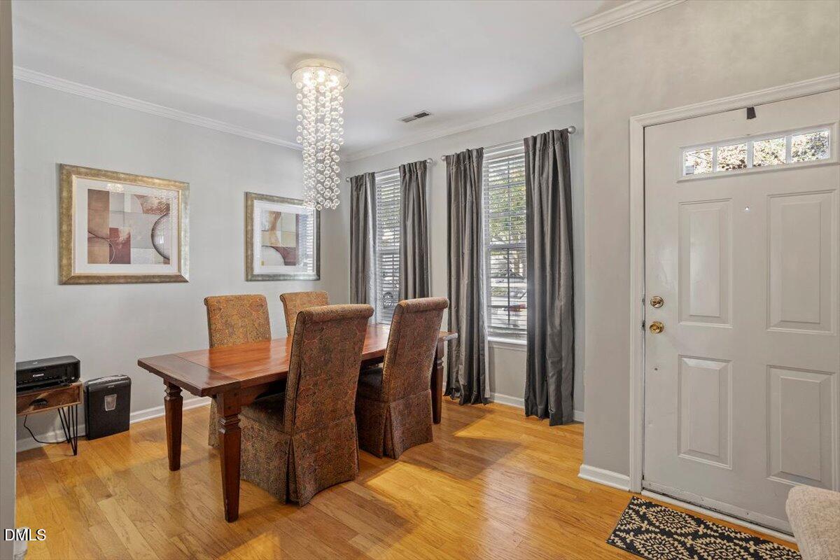 5710 Corbon Crest Lane Raleigh, NC 27612 - Photo 6 of 25 a view of a livingroom with furniture and window