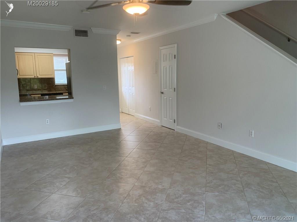 3129 Southeast Indian Street, Unit 3 Stuart, FL 34997 - Photo 3 of 10 a view of an empty room