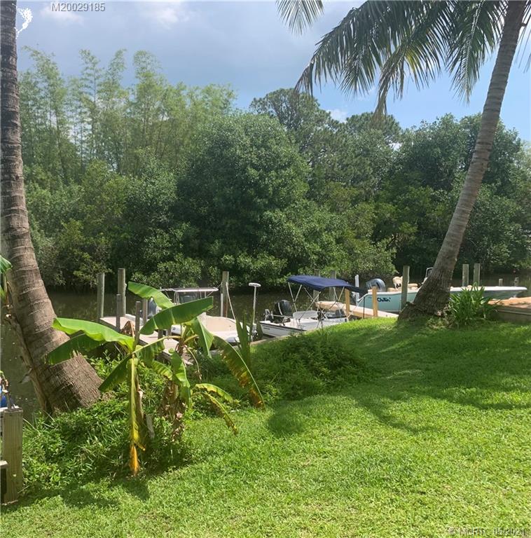 3129 Southeast Indian Street, Unit 3 Stuart, FL 34997 - Photo 10 of 10 a view of backyard with swimming pool