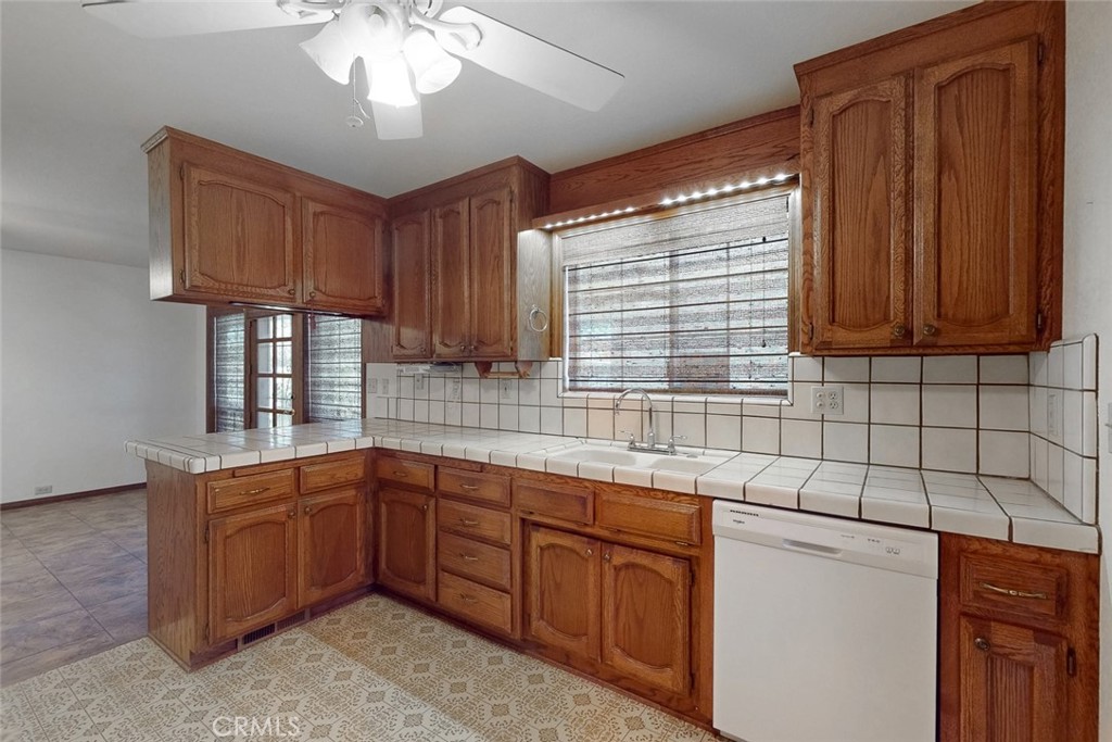510 Indiana Street Gridley, CA 95948 - Photo 14 of 45 a kitchen with a sink cabinets and window