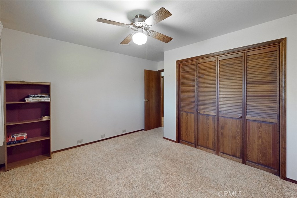 510 Indiana Street Gridley, CA 95948 - Photo 22 of 45 an empty room with closet and windows