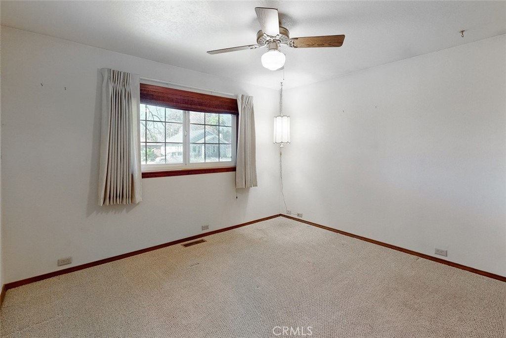 510 Indiana Street Gridley, CA 95948 - Photo 24 of 45 an empty room with windows and fan