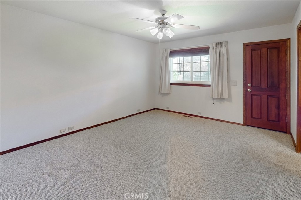 510 Indiana Street Gridley, CA 95948 - Photo 31 of 45 an empty room with windows and fan