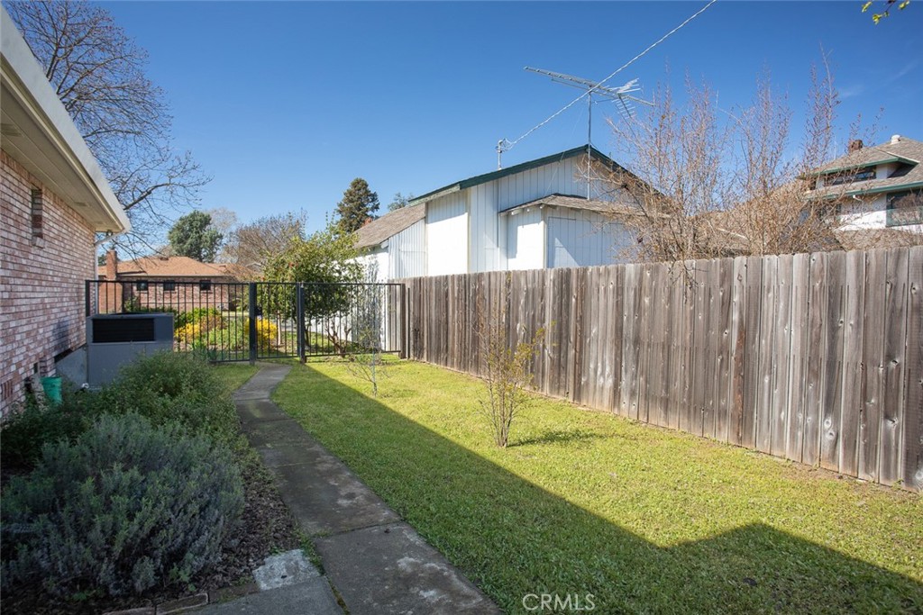 510 Indiana Street Gridley, CA 95948 - Photo 41 of 45 a view of backyard with a garden and deck