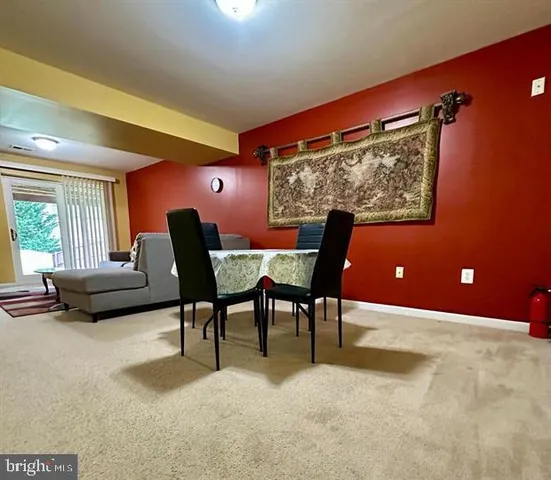 a workspace with furniture and window