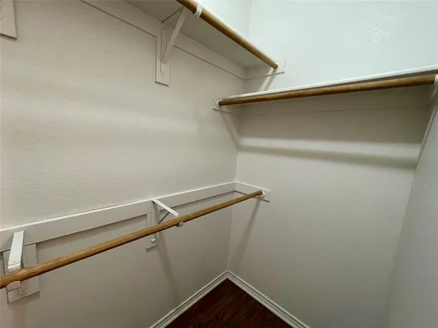 a view of a room with racks on the wall