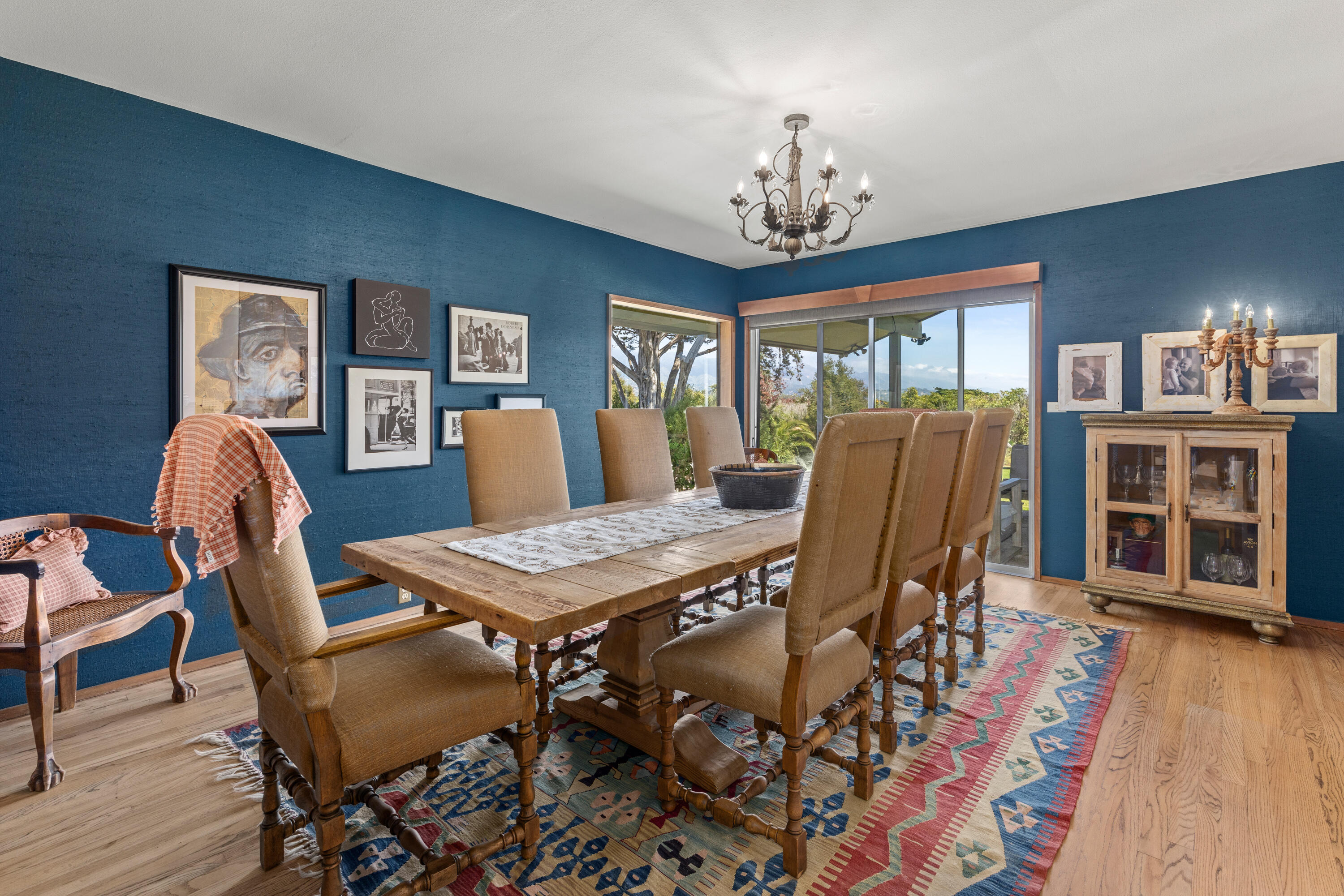 785 Carosam Road Santa Barbara, CA 93110 - Photo 12 of 46 a view of a dining room with furniture window and wooden floor