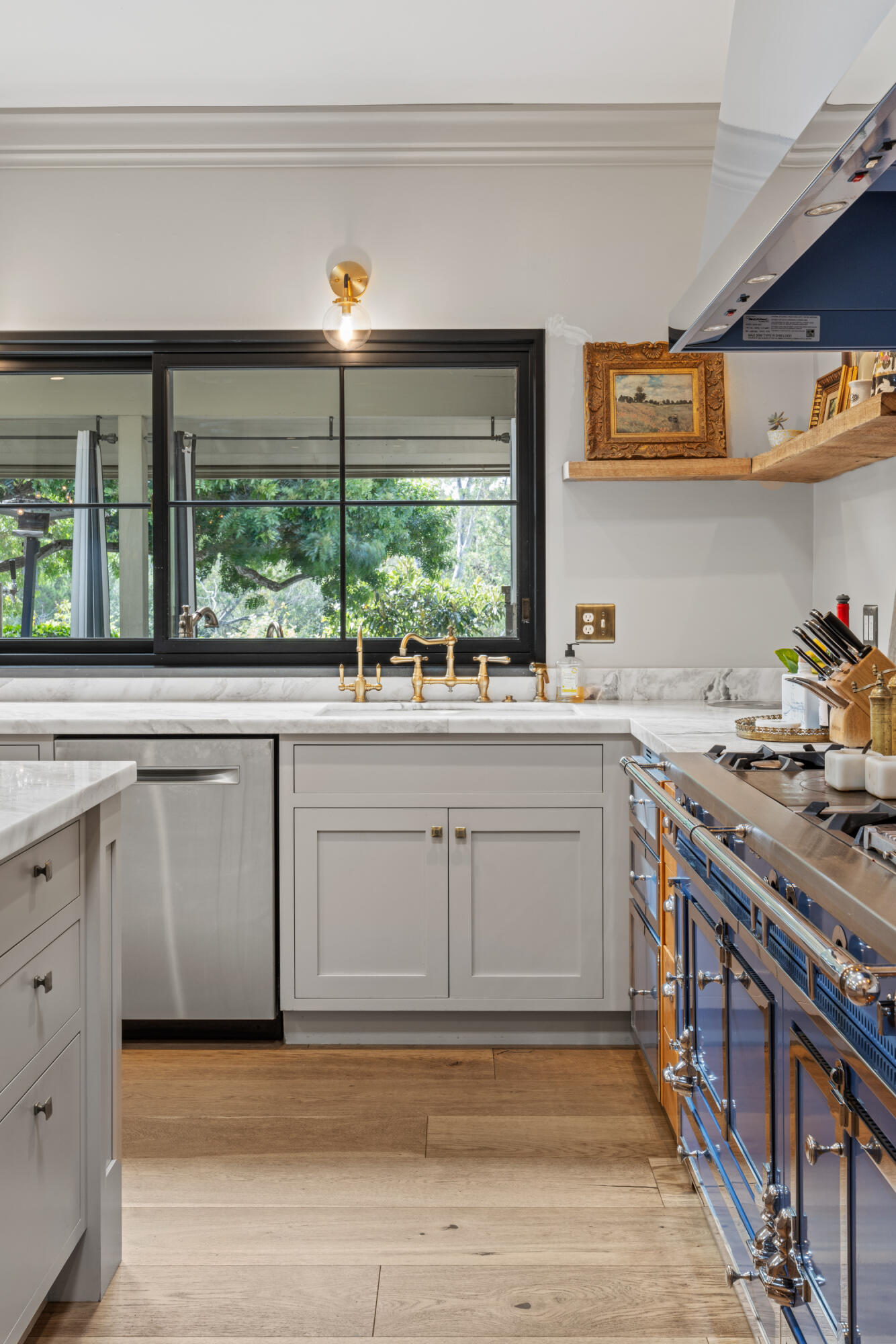 785 Carosam Road Santa Barbara, CA 93110 - Photo 16 of 46 a kitchen with a stove a sink and a window