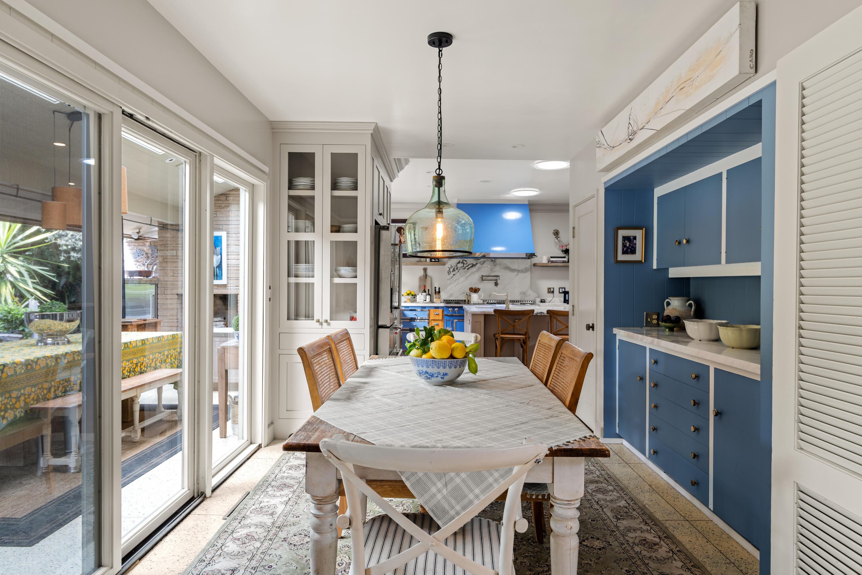 785 Carosam Road Santa Barbara, CA 93110 - Photo 19 of 46 a view of kitchen island dining room cabinets and wooden floor