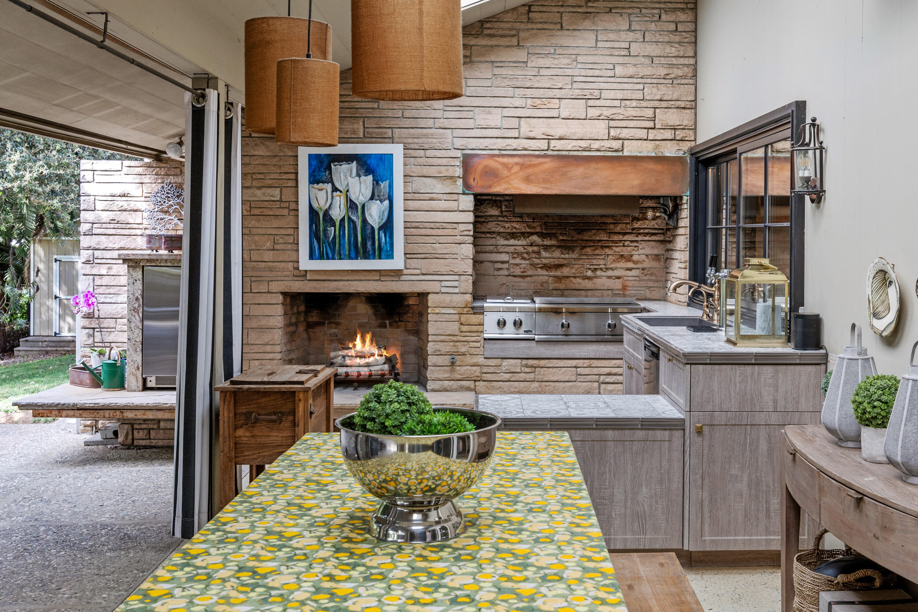 785 Carosam Road Santa Barbara, CA 93110 - Photo 21 of 46 a living room with furniture and a fireplace