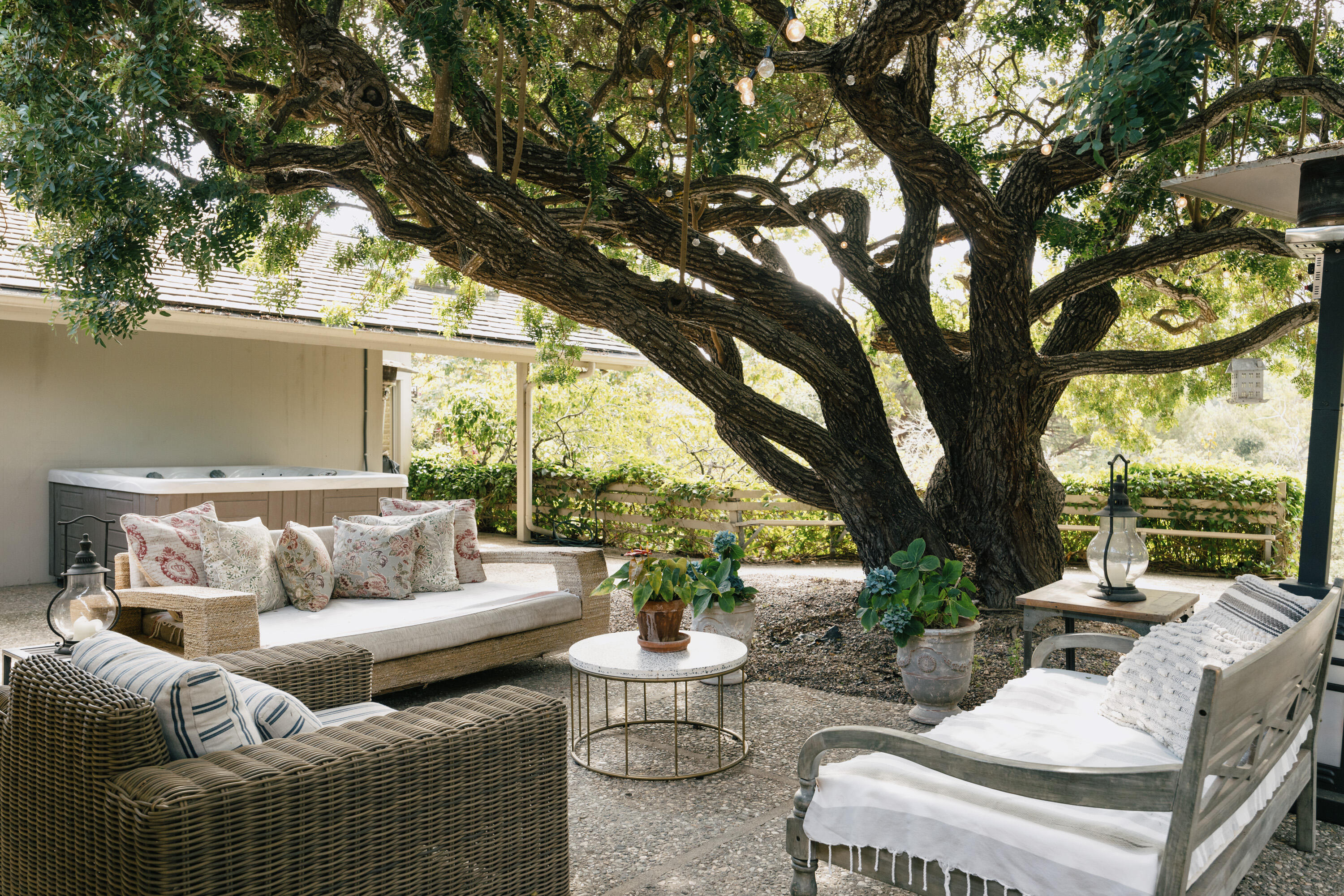 785 Carosam Road Santa Barbara, CA 93110 - Photo 24 of 46 a view of a patio with couches plants and large trees